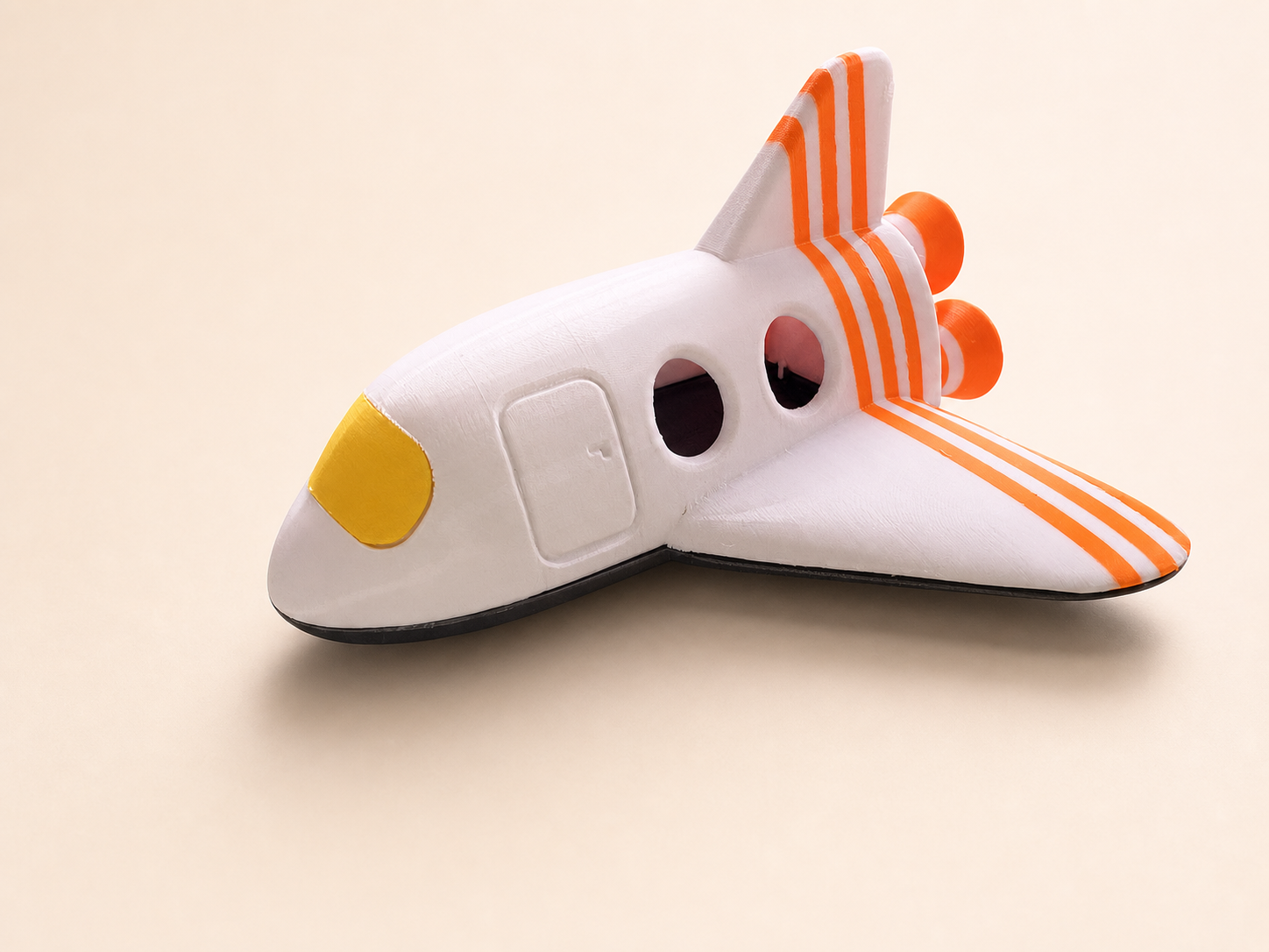 White and orange spacecraft model